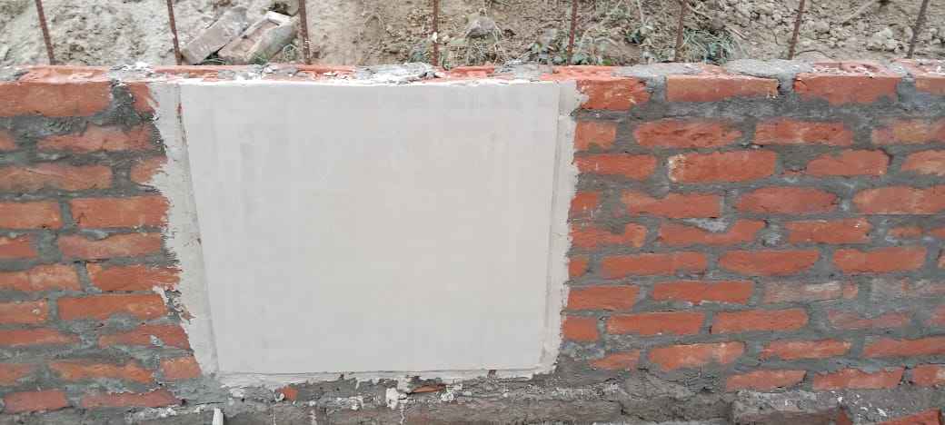Direct Plaster Patch Test on Red Brick Wall
